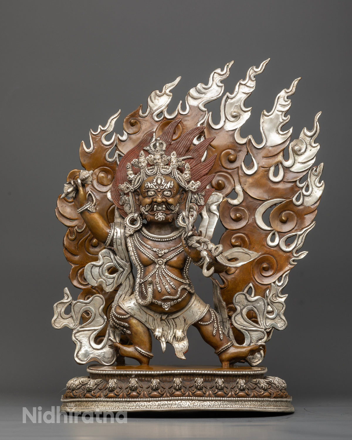 Vajrapani statue handcrafted by newari artist from patan nepal with silver plated finish.