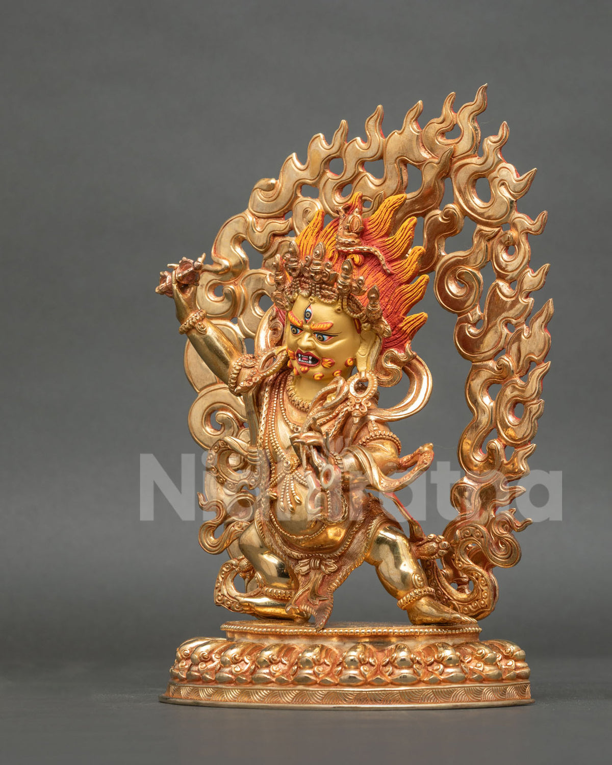 Vajrapani Statue left side view five skull crown coiled serpent tiger skin.