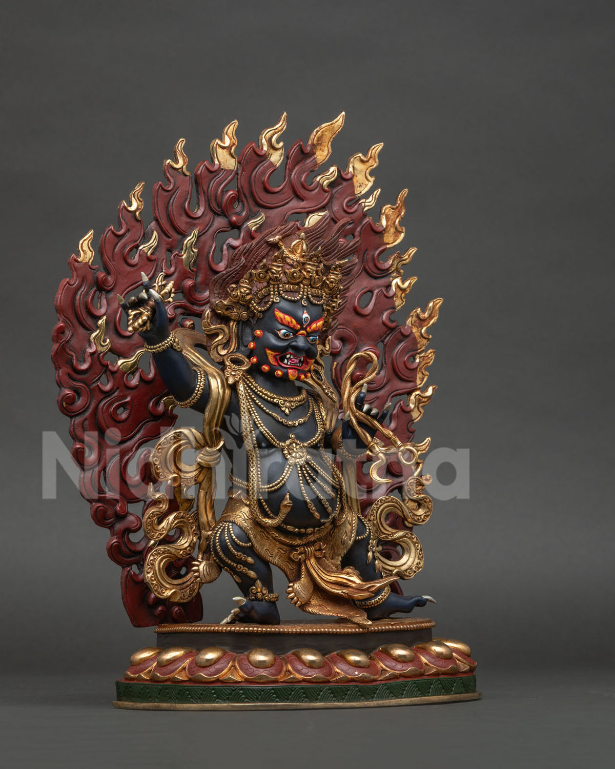 Vajrapani Statue right side view showing Vajra and dynamic stance