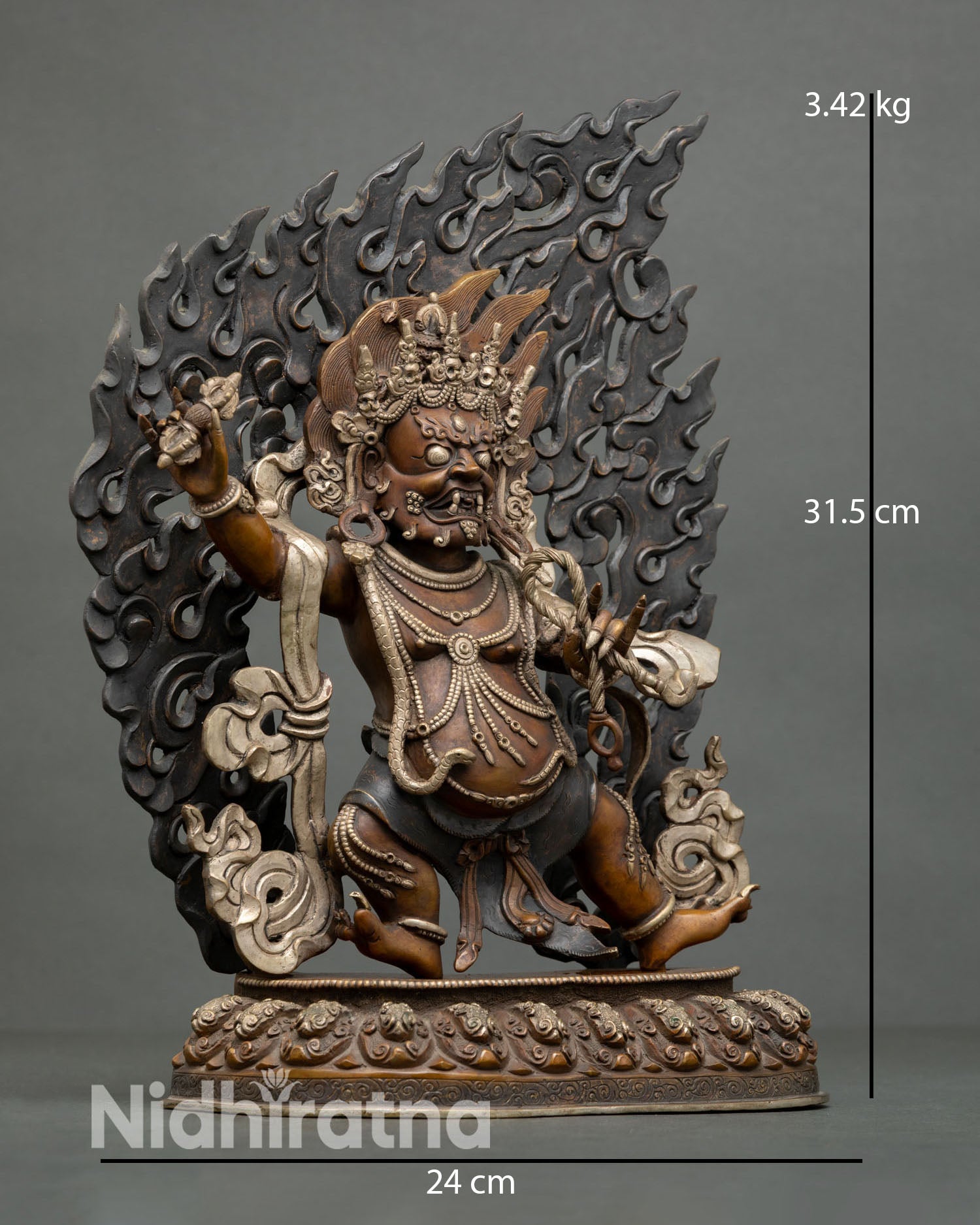 Vajrapani statue side view dynamic posture oxidized copper sacred flames protector deity sculpture