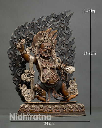 Vajrapani statue side view dynamic posture oxidized copper sacred flames protector deity sculpture