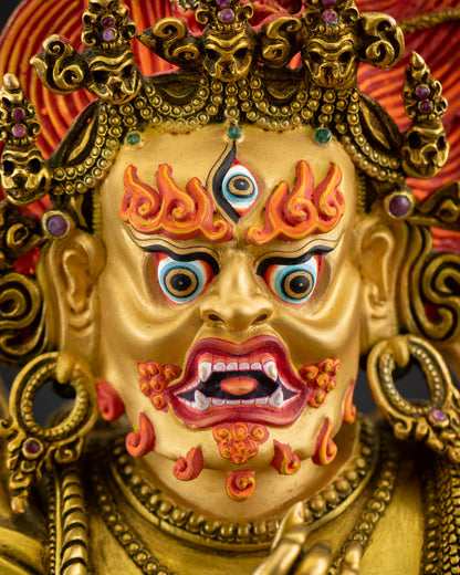 Vajrapani wrathful face gold painted features third eye fierce protector deity copper sculpture Tibetan Buddhist guardian sacred altar artwork