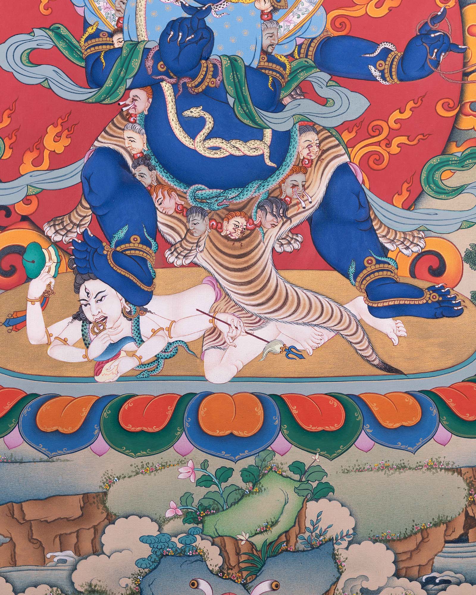 Vajrapani's serpent-coiled torso above a trampled figure on the lotus base