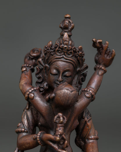 Vajrasattva and consort yab yum statue holding vajra bell kartika and kapala.