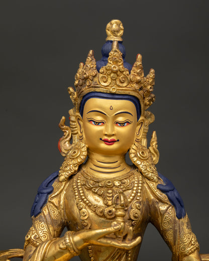 Vajrasattva buddha face with gold painted details and jewel diadem.