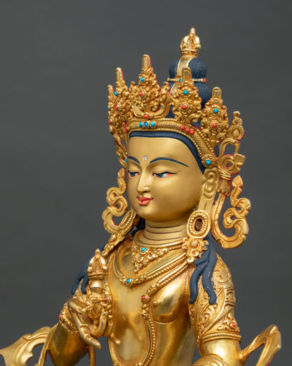 Vajrasattva Buddha statue side face view gold gilded Newari craftsmanship Patan Nepal.