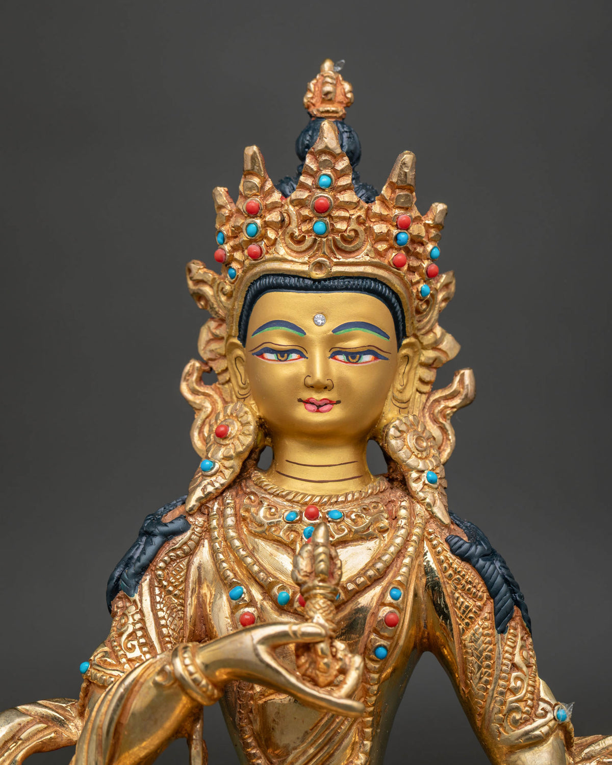 Vajrasattva Buddhist statue gold painted face semi precious stones.