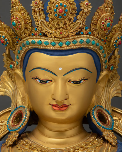 Vajrasattva face close-up gold mineral painted urna coral lips serene expression Newar art