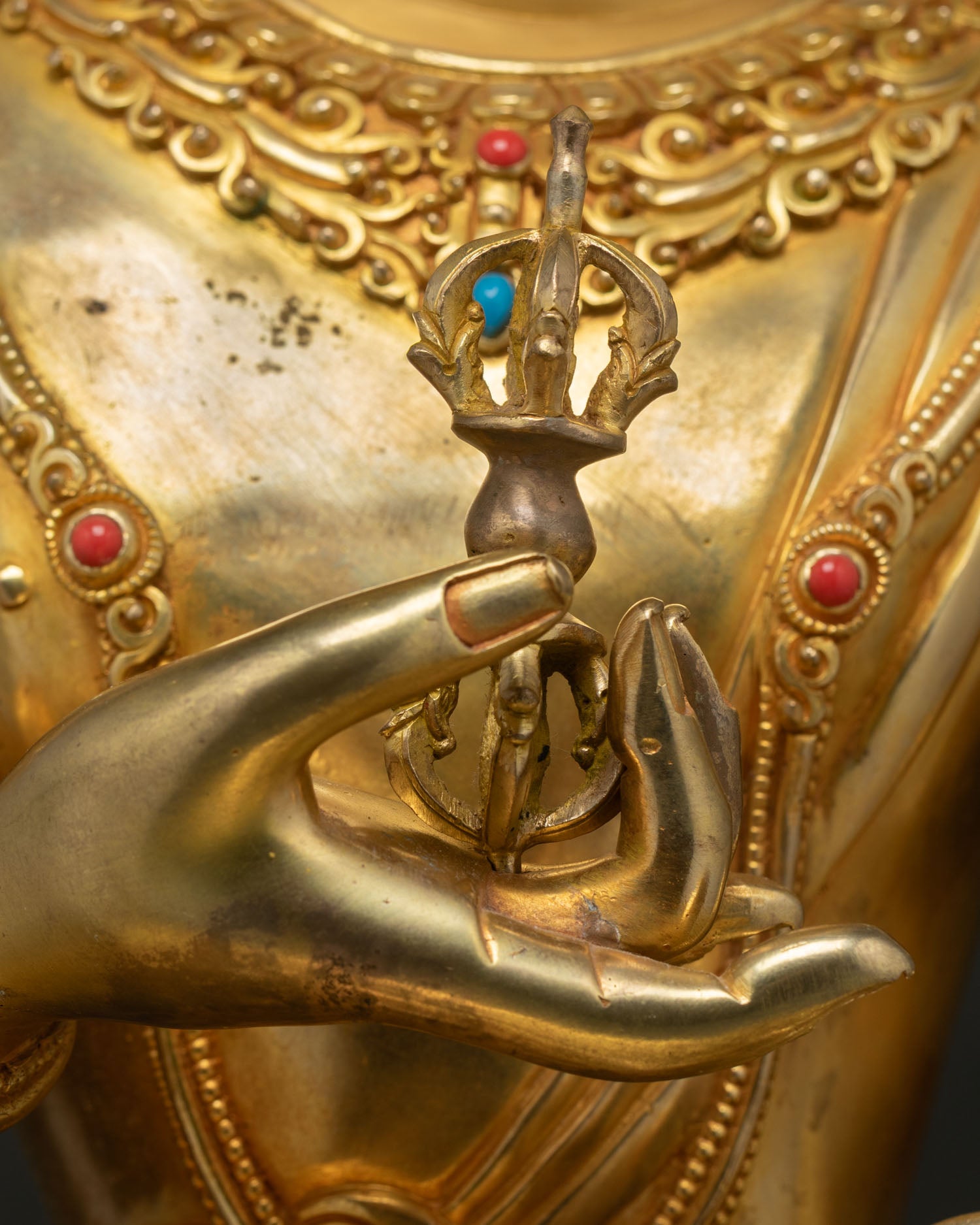 Vajrasattva hands holding five-pronged vajra purification deity sculpture