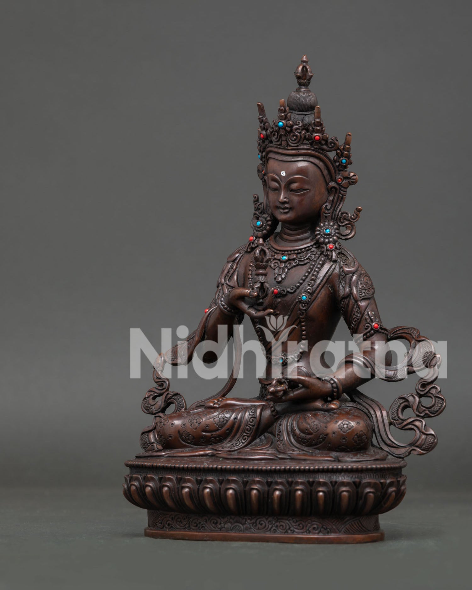 Vajrasattva Seated in Vajraparyanka Posture with Ornate Silk Garments.