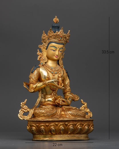 Vajrasattva seated on finely carved lotus pedestal holding vajra and bell.