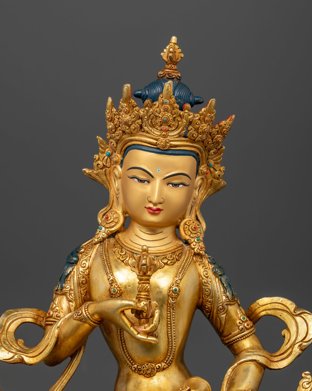 Vajrasattva statue 24K gold painted face five jewel crown lotus pedestal.