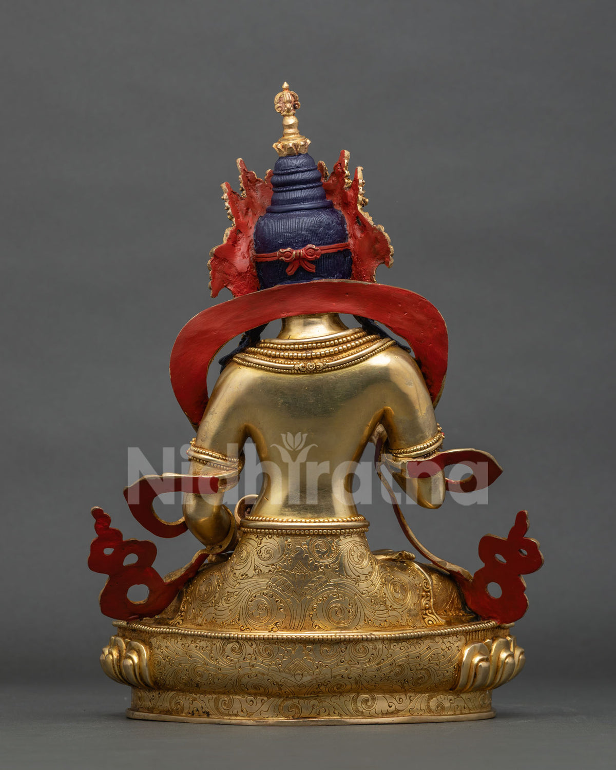 Vajrasattva statue back view, engraved lotus base and crown detail