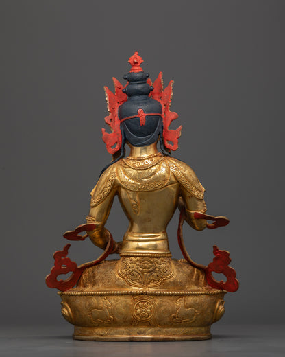 Vajrasattva Statue back view intricate robe carvings floral motifs.