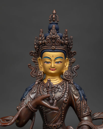 Vajrasattva Statue Close Up 24K Gold Painted Face Five Pronged Vajra Ritual Bell.