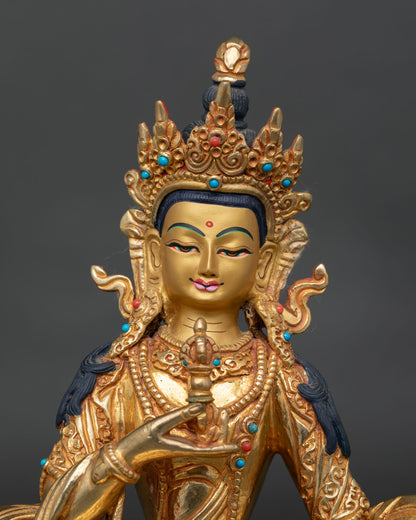 Vajrasattva statue close up, detailed handcrafted copper work with gold fire gilded finish