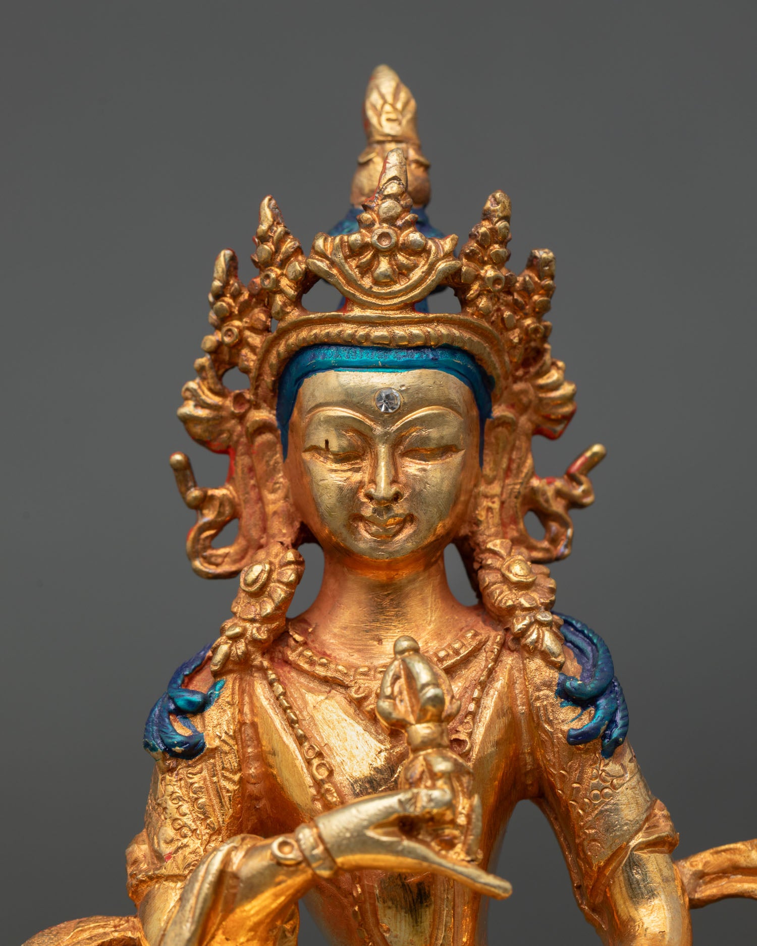vajrasattva statue close up handmade himalayan buddhist art with gold gilding