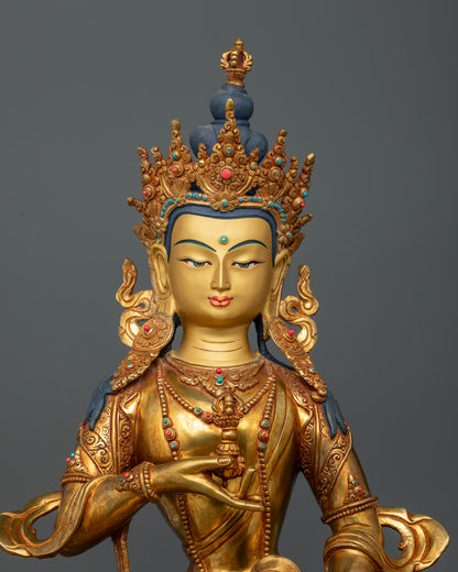 Vajrasattva Statue close up view highlighting vajra bell and intricate floral carvings