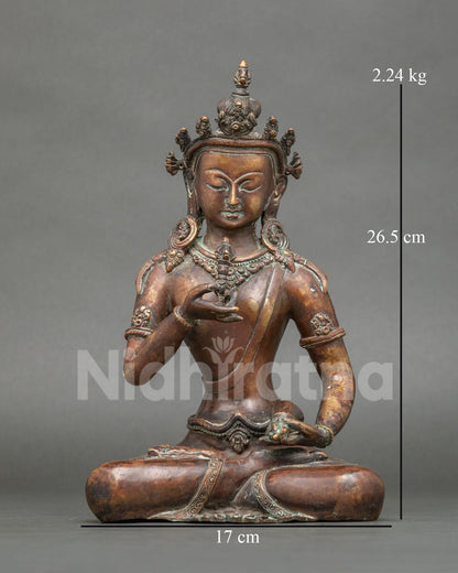 Vajrasattva statue front view oxidized copper Buddhist sculpture from Nepal.