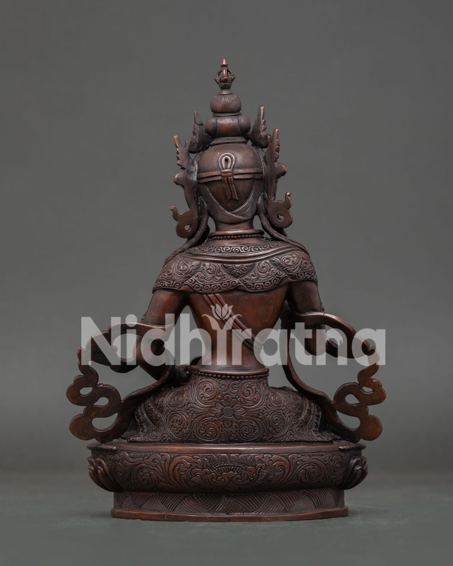 Vajrasattva Statue Handcrafted in Nepal with Oxidized Copper Finish.