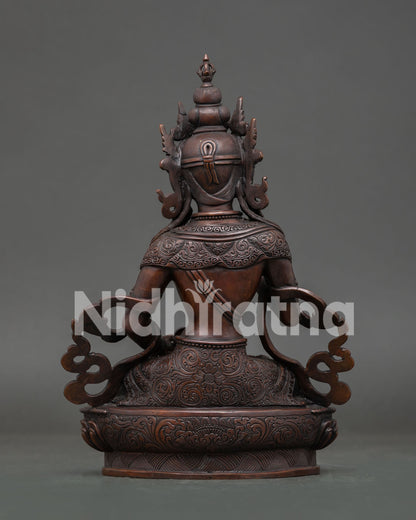 Vajrasattva Statue Handcrafted in Nepal with Oxidized Copper Finish.