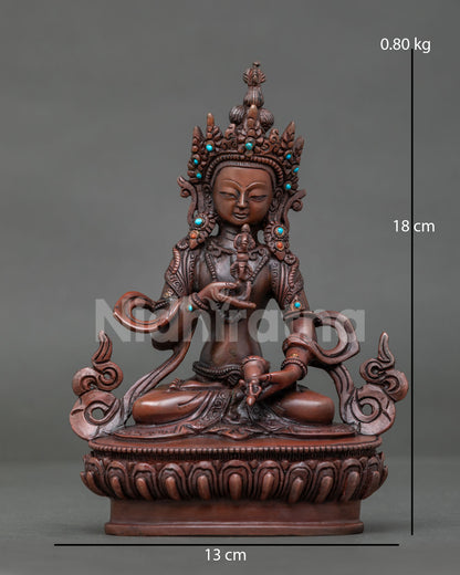 Vajrasattva statue seated on lotus throne with oxidized copper finish and semi precious stones.