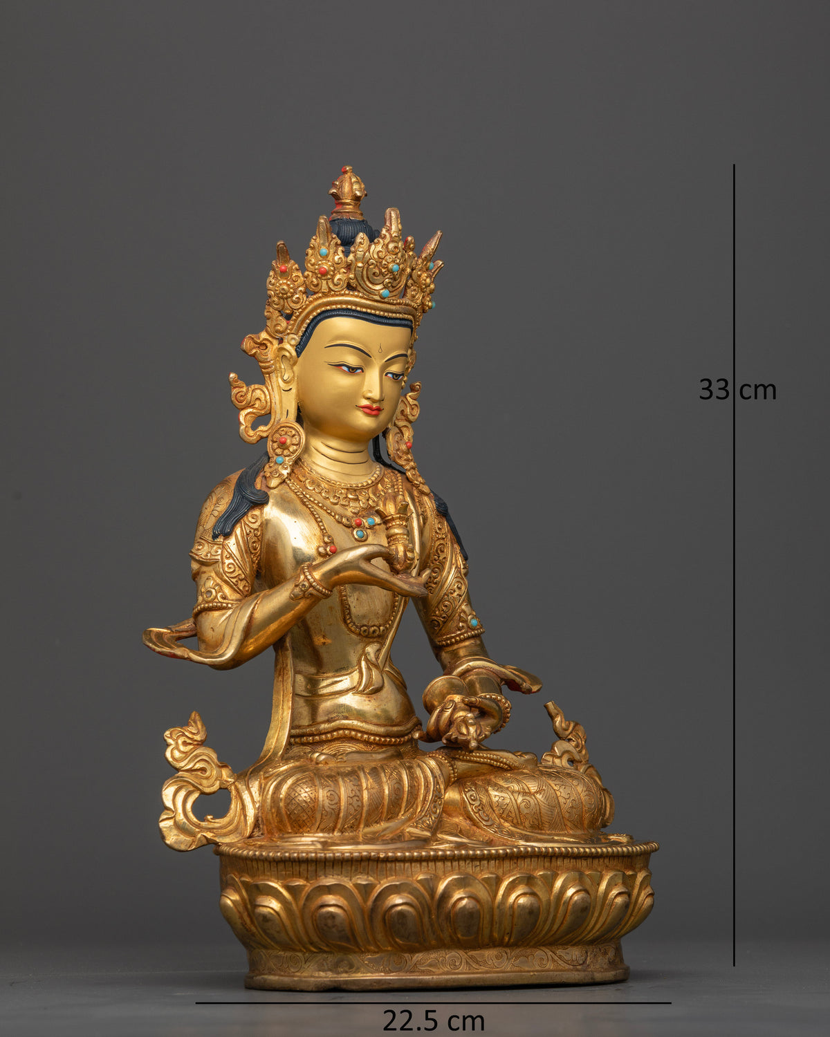Vajrasattva Statue side view vajra ritual bell five jewel crown.