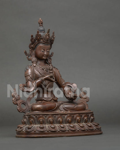 Vajrasattva Statue side view with vajra bell and double lotus pedestal