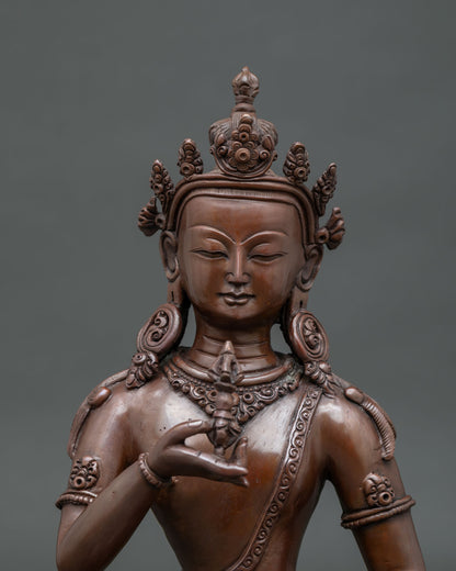 Vajrasattva statue with five jewel crown and layered necklaces.