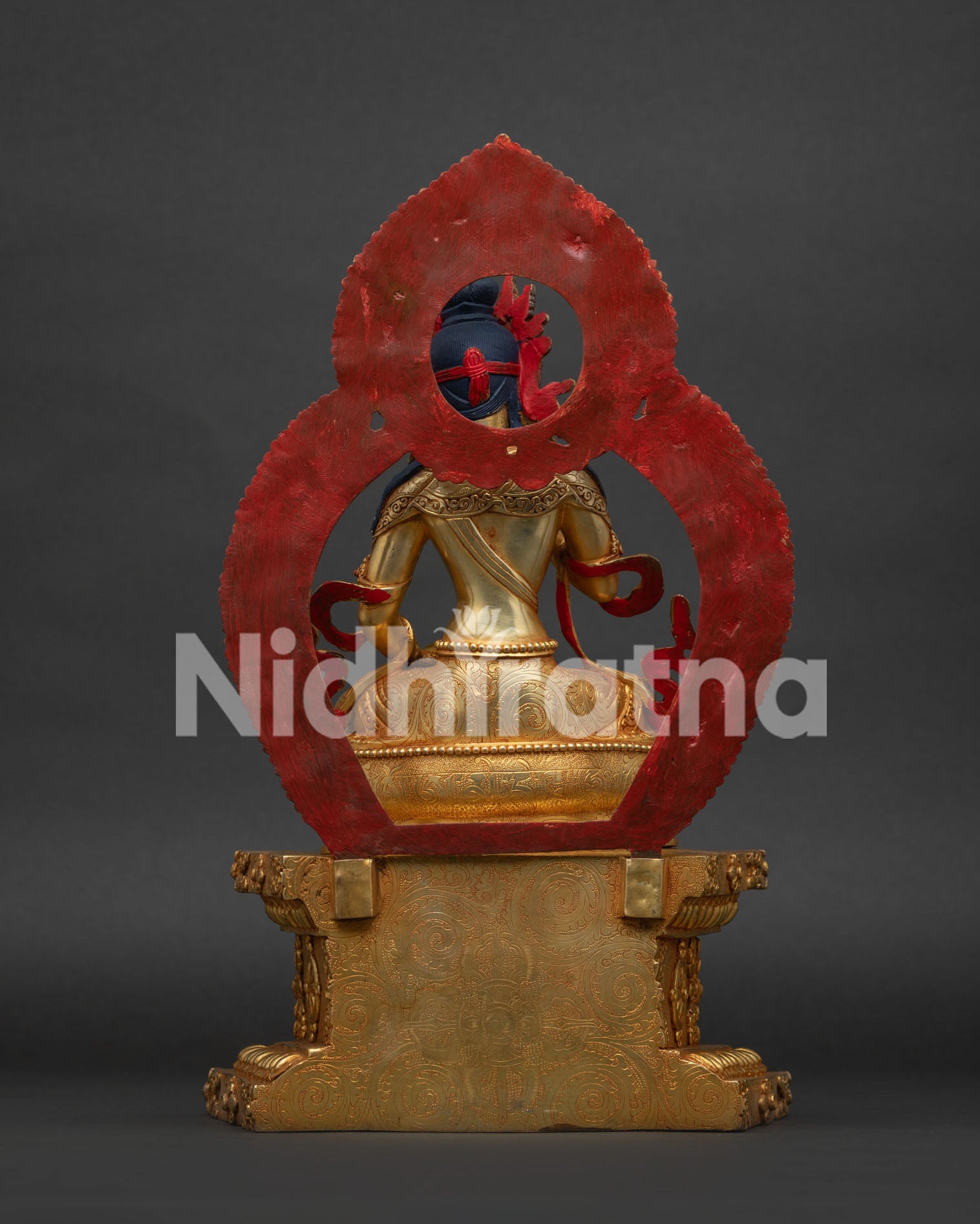 Vajrasattva Statue with Shell Shaped Halo Handcrafted in Nepal.