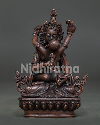 Vajrasattva with consort statue handcrafted in Patan Nepal copper oxidized finish.