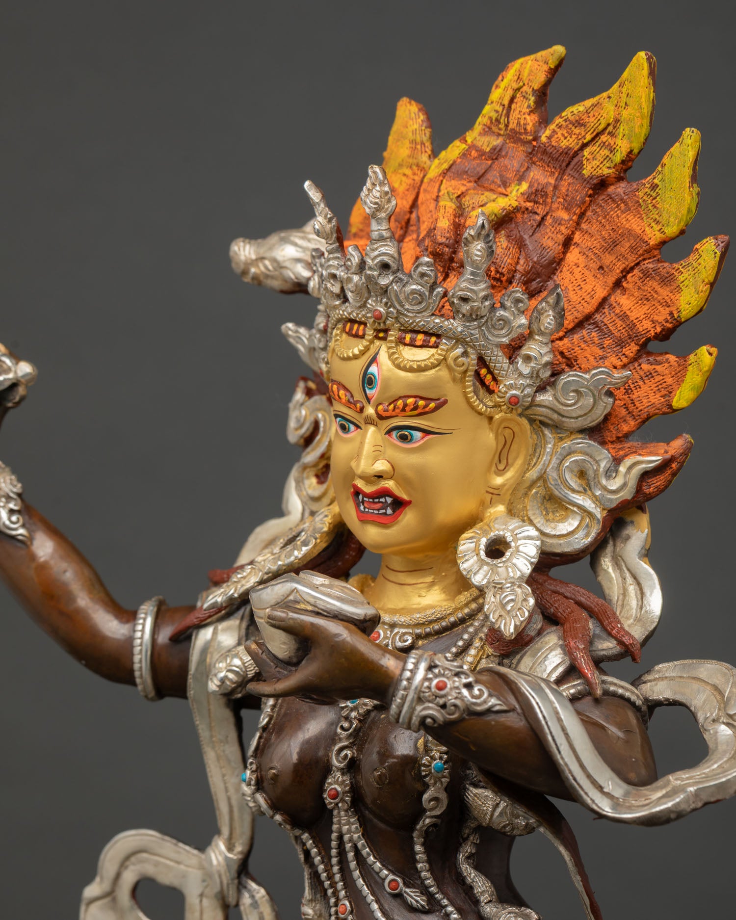 Vajravarahi Dorje Phagmo statue side close up dynamic stance kapala kartika khatvanga flaming halo ritual detail