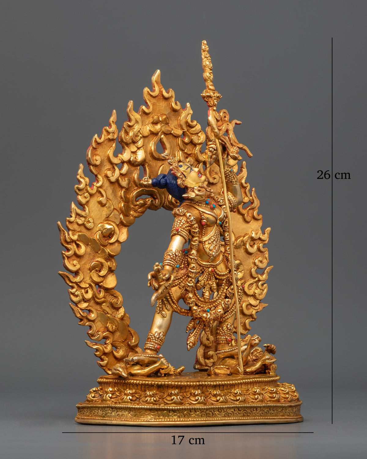 Vajrayogini Buddhist goddess wearing a five-skull crown and skull garland while holding a kartika knife and skull cup