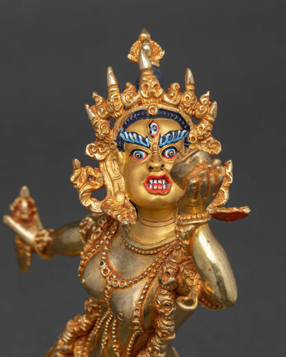 vajrayogini face close up fierce expression third eye gold painted wrathful dakini sculpture nepal