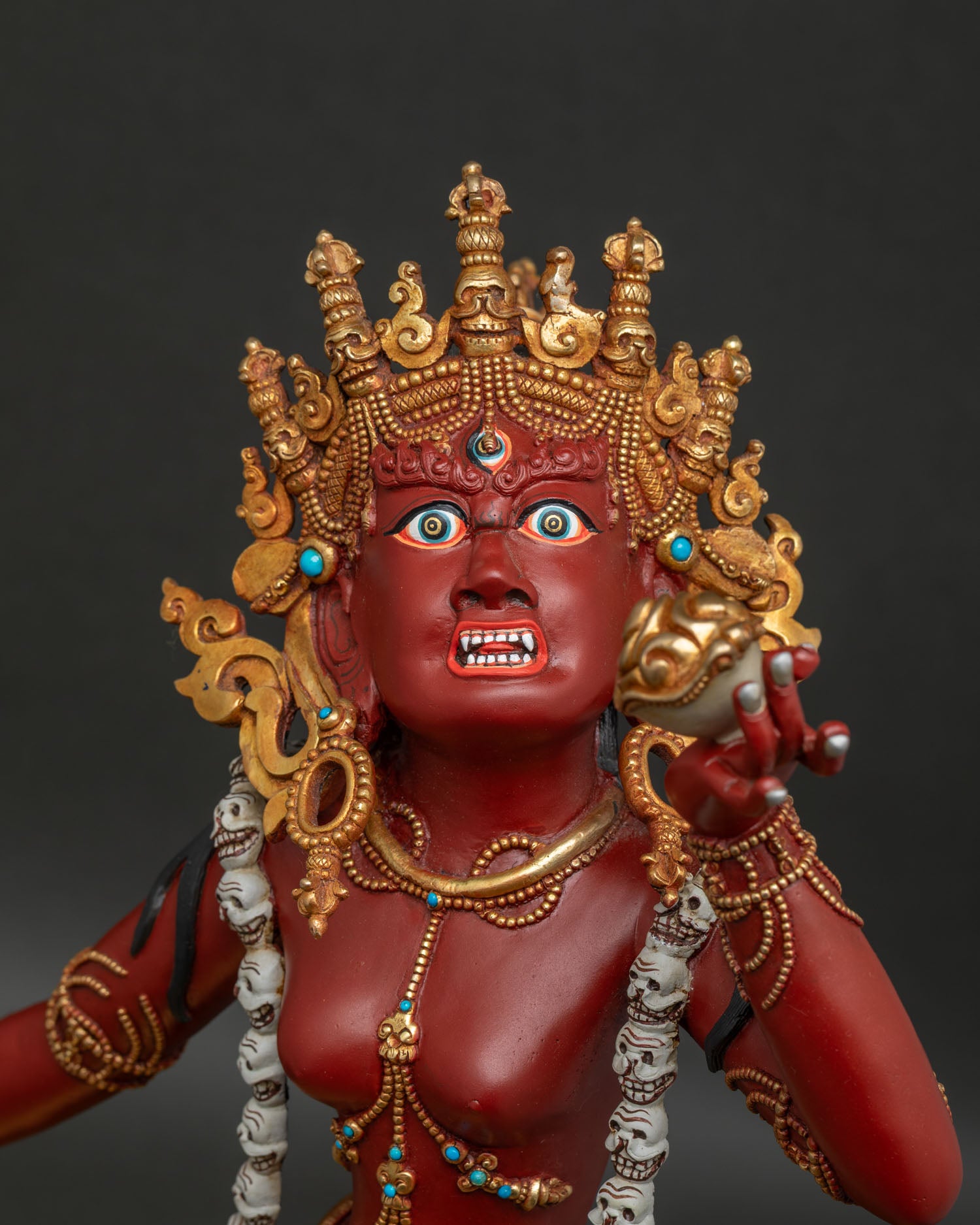 Vajrayogini Statue Face Close Up with Fierce Expression and Gold gilded Details