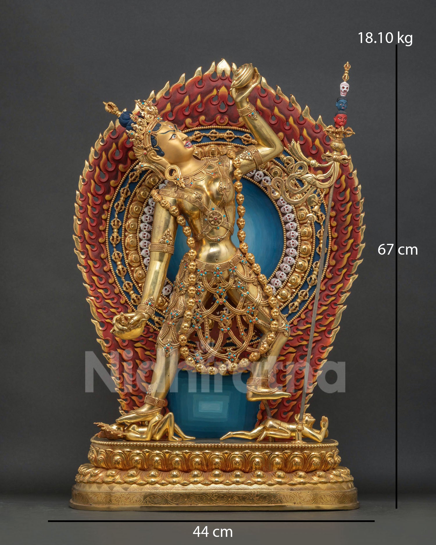 Vajrayogini statue side view with khatvanga staff and blazing halo, Nepal Buddhist art