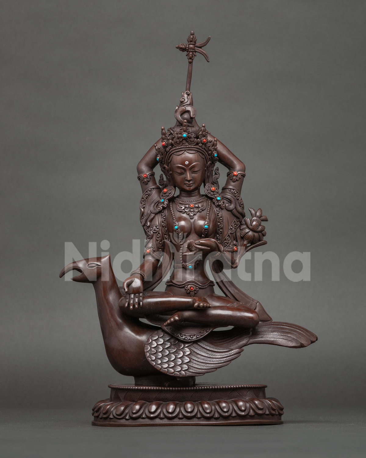Varada Tara statue, boon-granting deity on a mythical mount, oxidized copper from Nepal