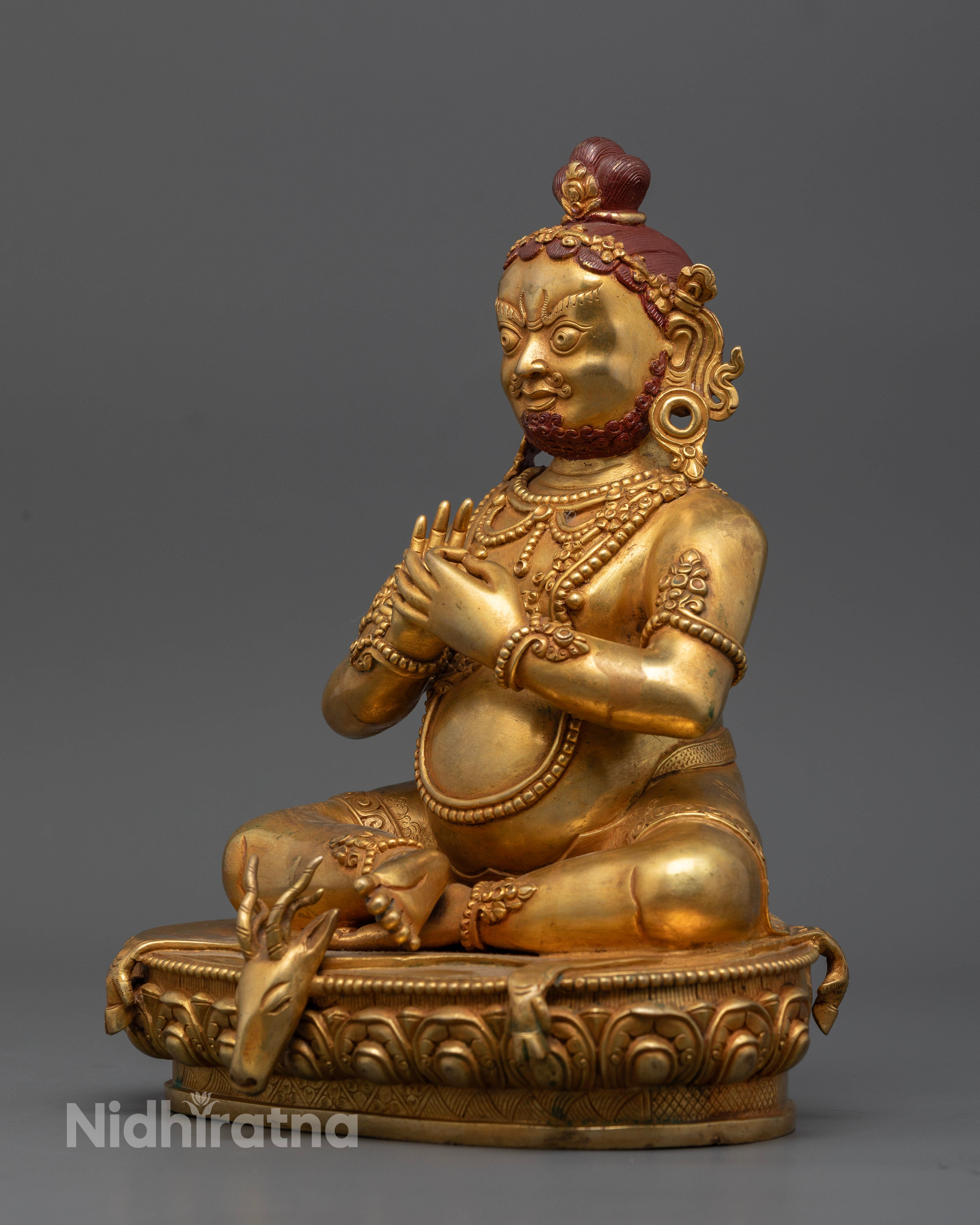 Virupa Buddhist statue showing Dharmachakra Mudra in gold gilded copper