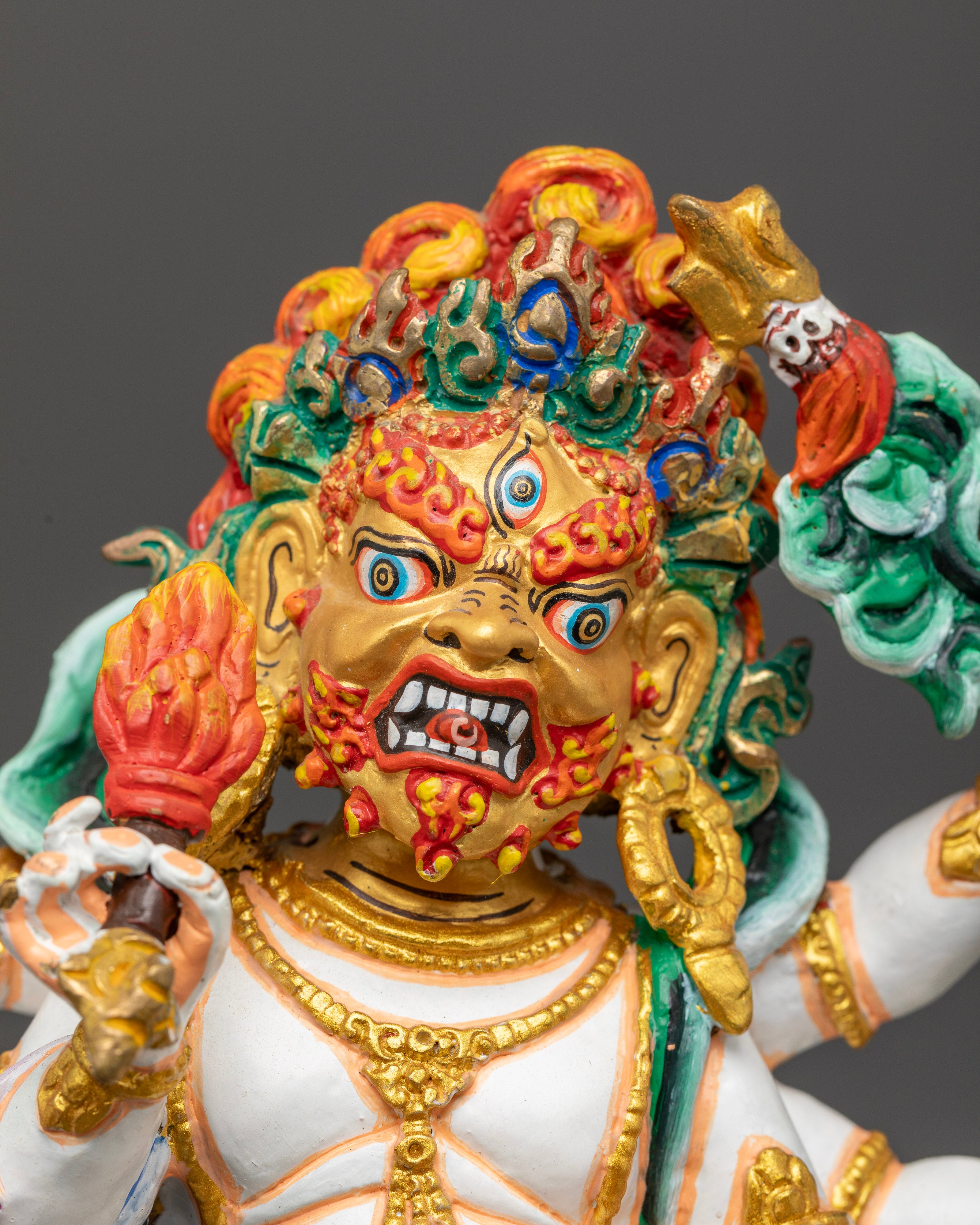 White Mahakala Buddhist statue with 24K gold painted face and lotus seat