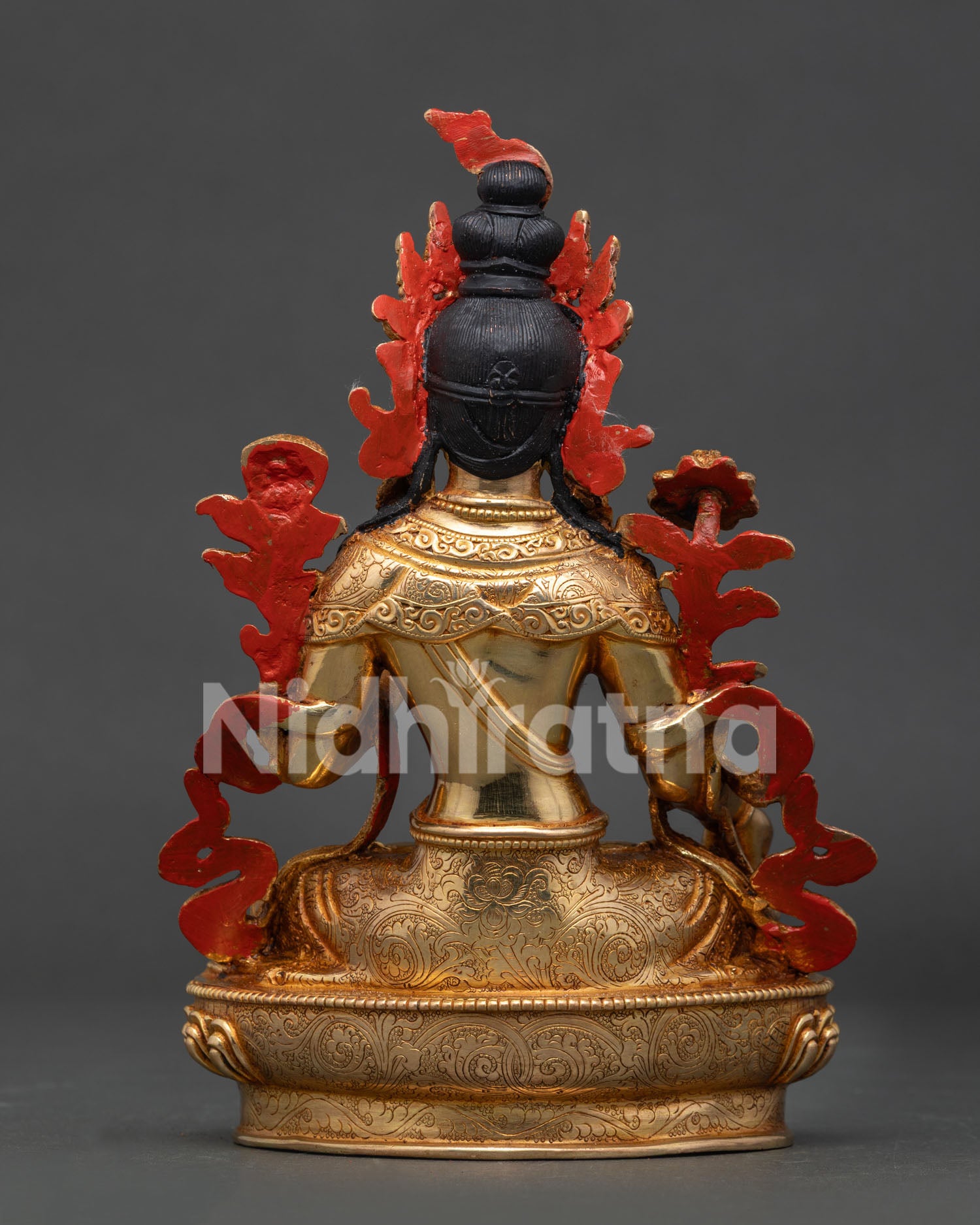 White Tara Buddhist sculpture with gold gilded and intricate floral motifs