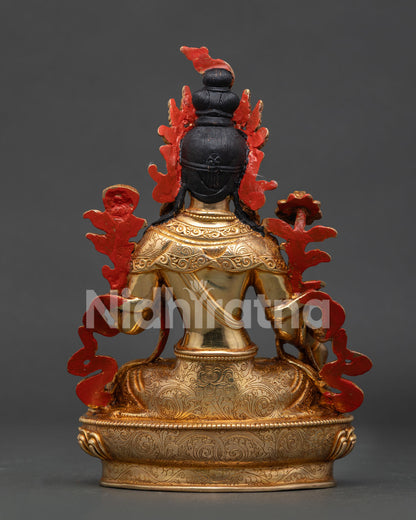 White Tara Buddhist sculpture with gold gilded and intricate floral motifs