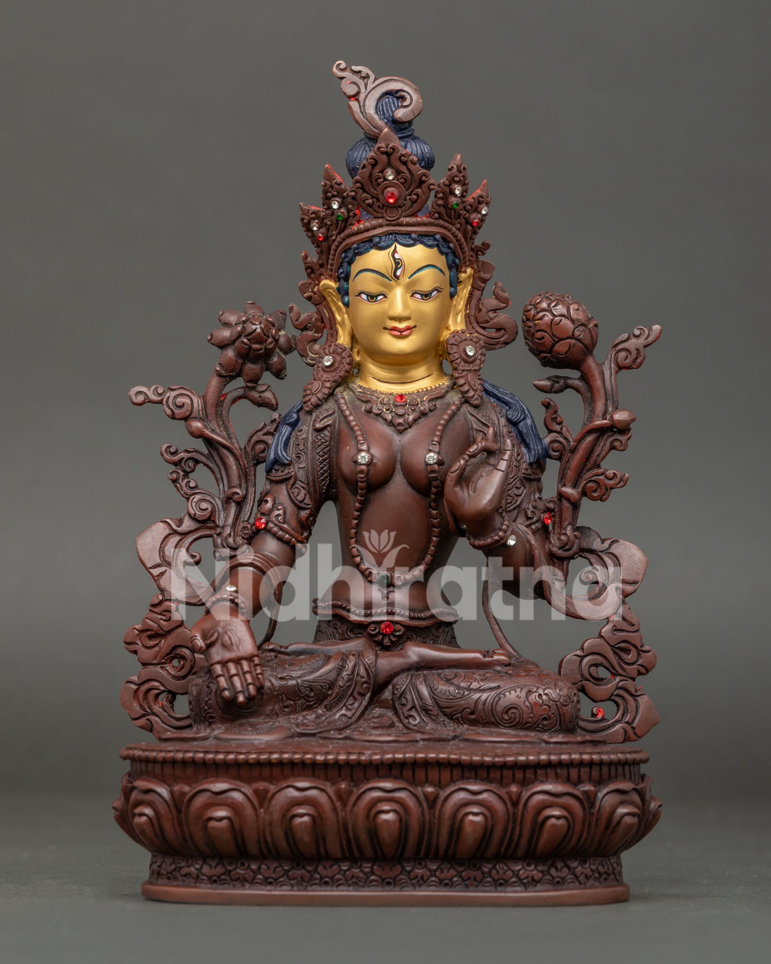 White Tara Buddhist Statue with Seven Eyes on Lotus Pedestal.