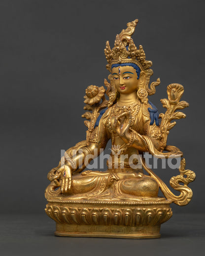 White Tara Copper Statue on Lotus Pedestal with Delicate Lotus Flowers.