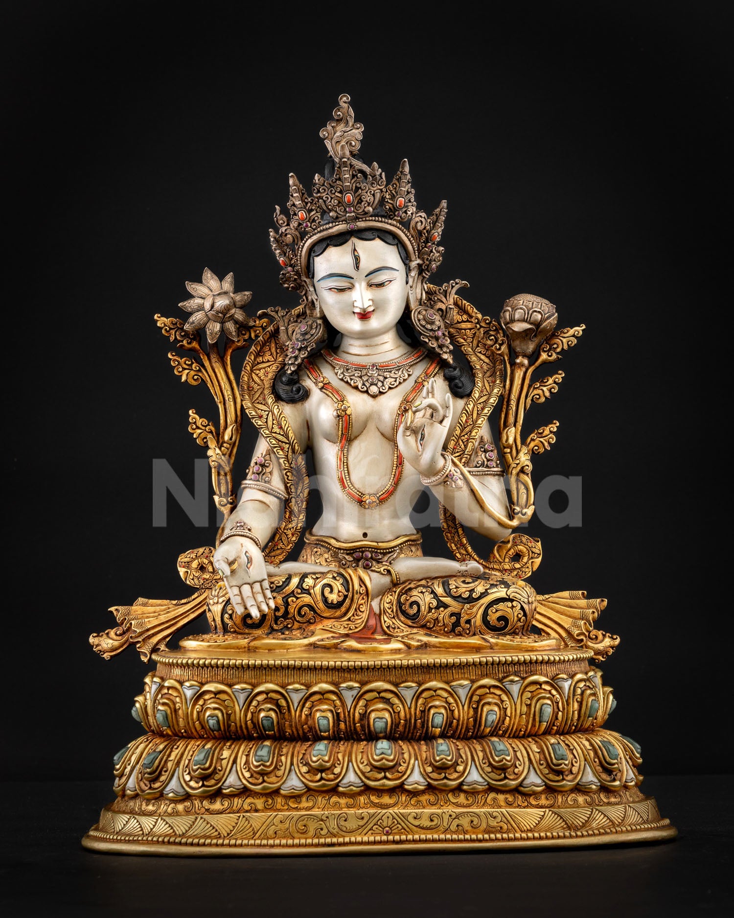 White Tara, crown ornaments, and spiritual healing iconography