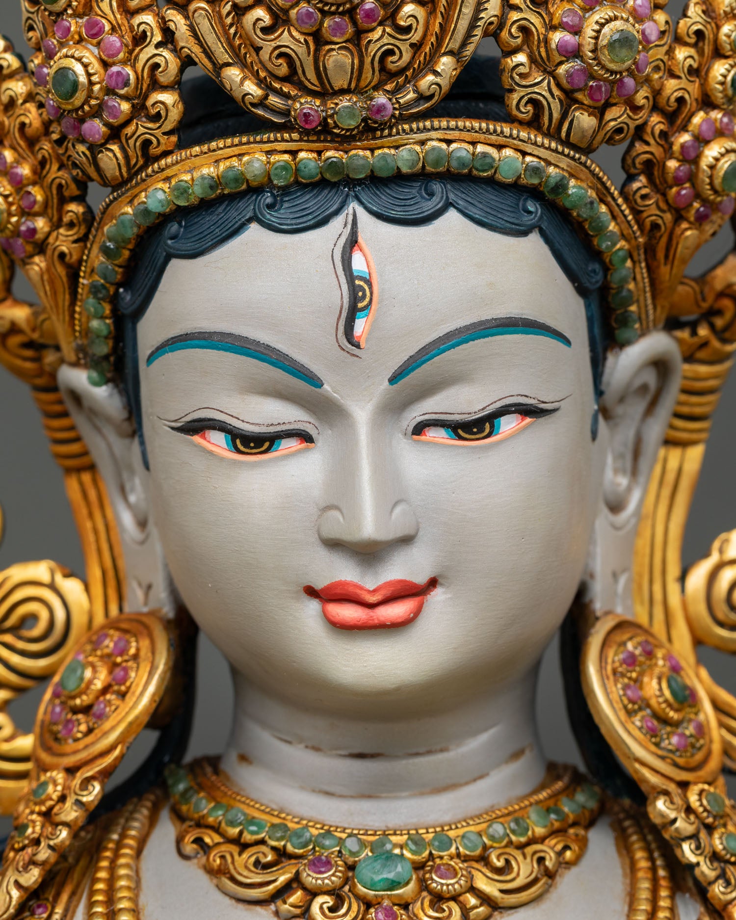 white tara face close up with seven eyes and compassionate expression details