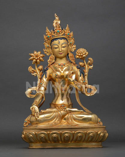 white tara meditation statue with gold fire gilding and lotus pedestal from nepal