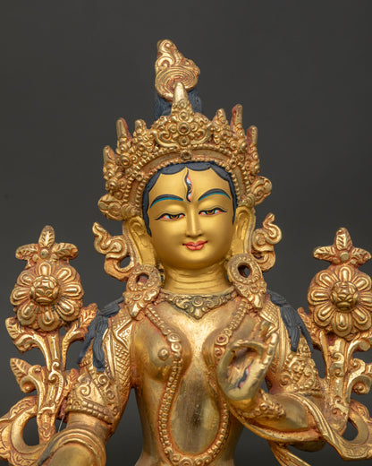 White Tara Nepalese Buddhist statue with jeweled crown and elegant ornaments.