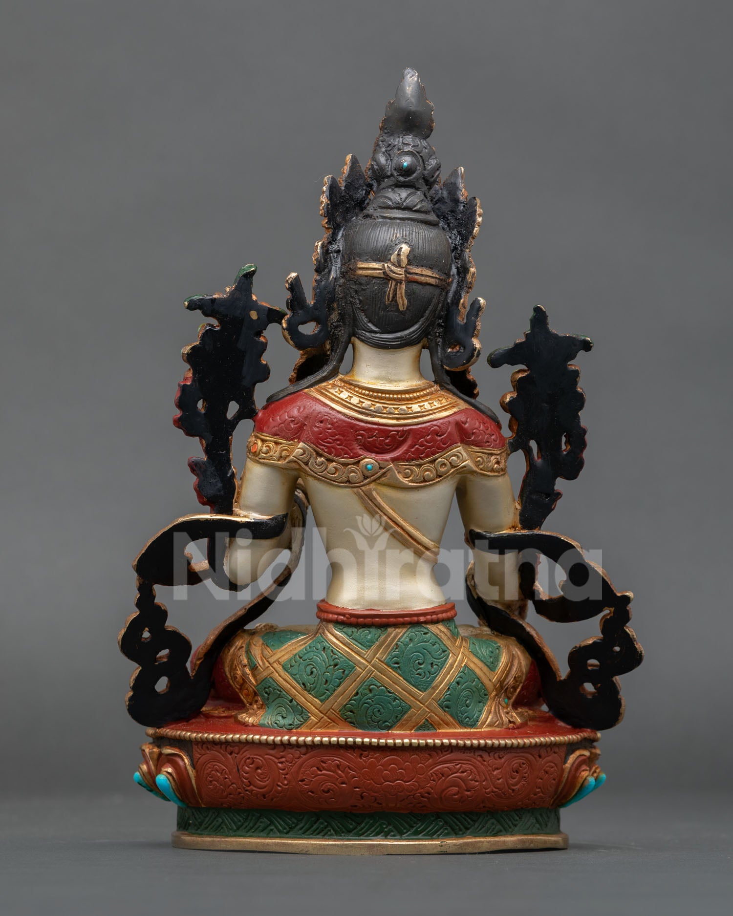 white tara statue back view detailed craftsmanship copper body engraved lotus throne sacred buddhist ritual art nepal