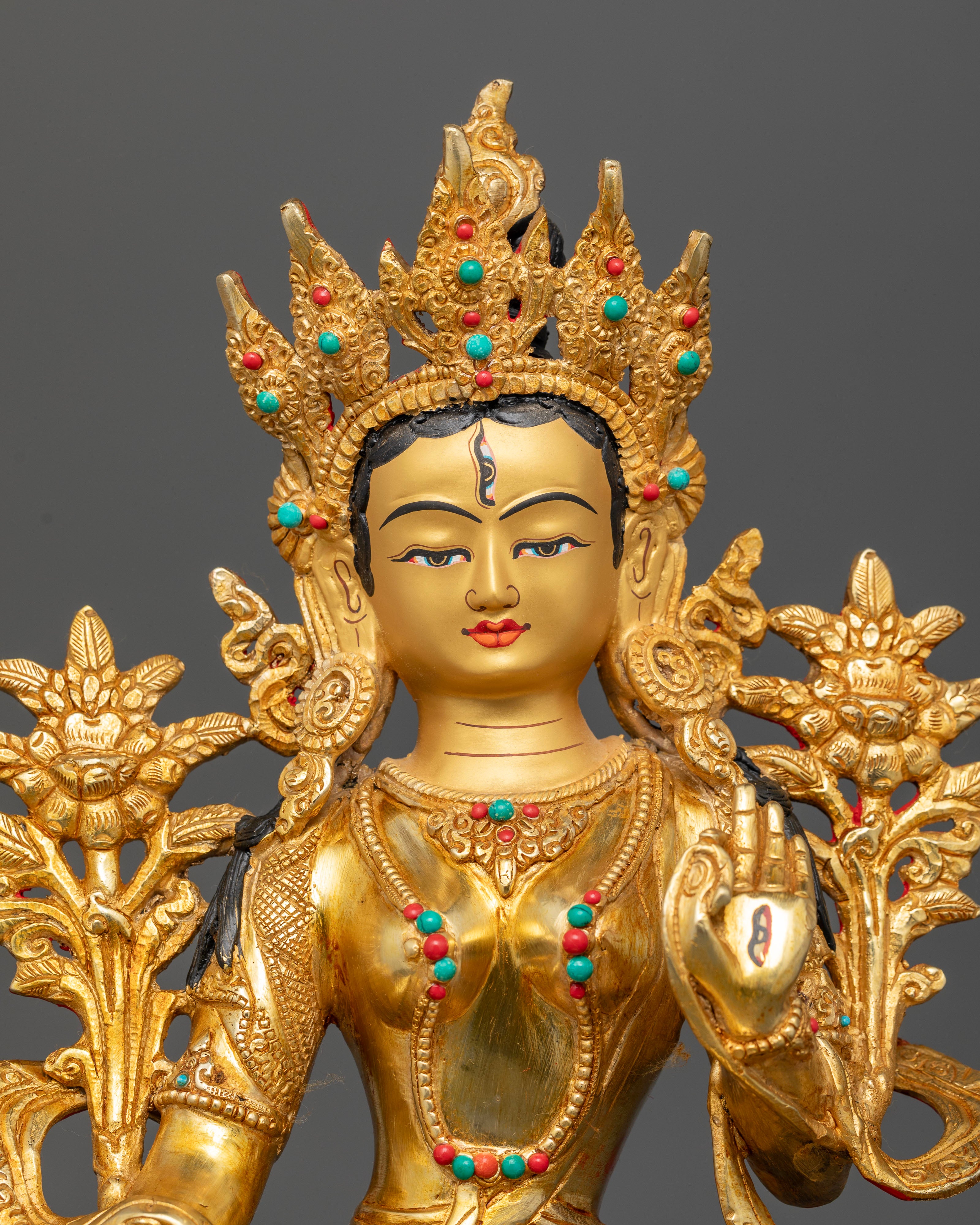 White Tara statue from Nepal with 24K gold fire gilding and gold-painted face