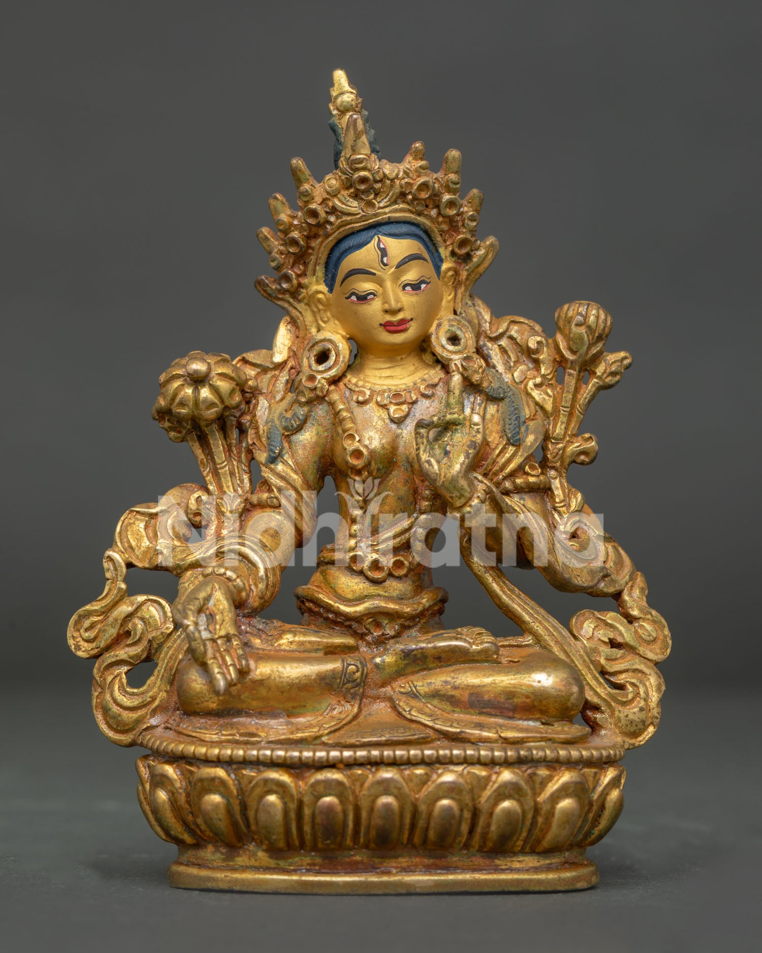 White Tara statue front view antique gold fire gilded copper from Nepal.
